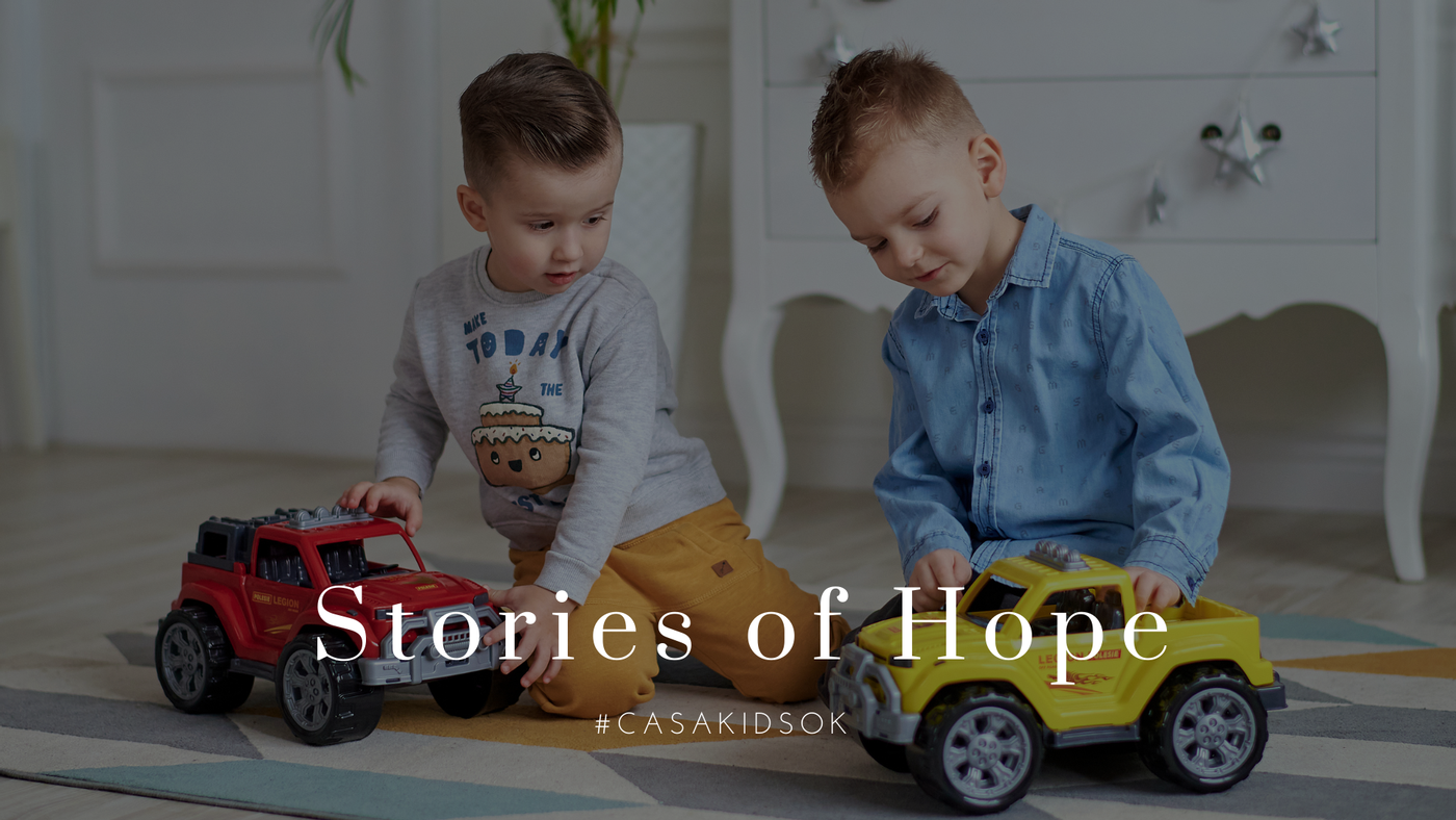 Stories of Hope. Boys Playing. Brothers. Trucks. 